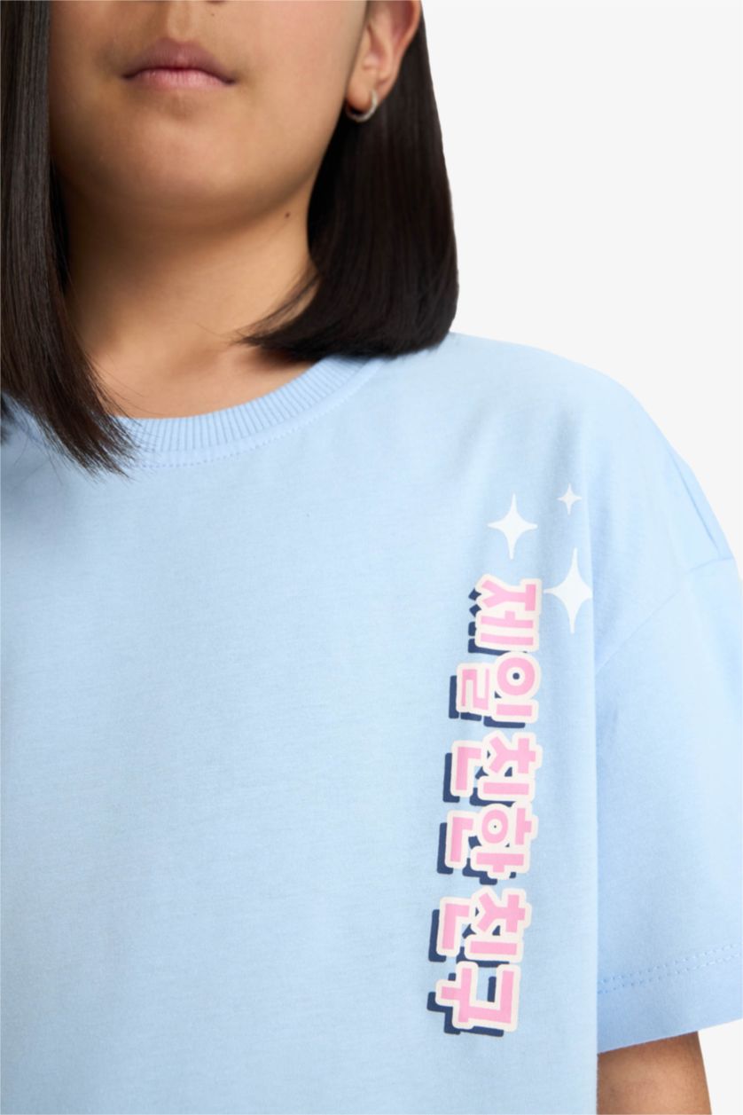 Kız Çocuk - Genç Kız Açık Mavi Oversize Geniş Kalıp Bisiklet Yaka Sırt Baskılı Kısa Kollu Tişört Kız Çocuk