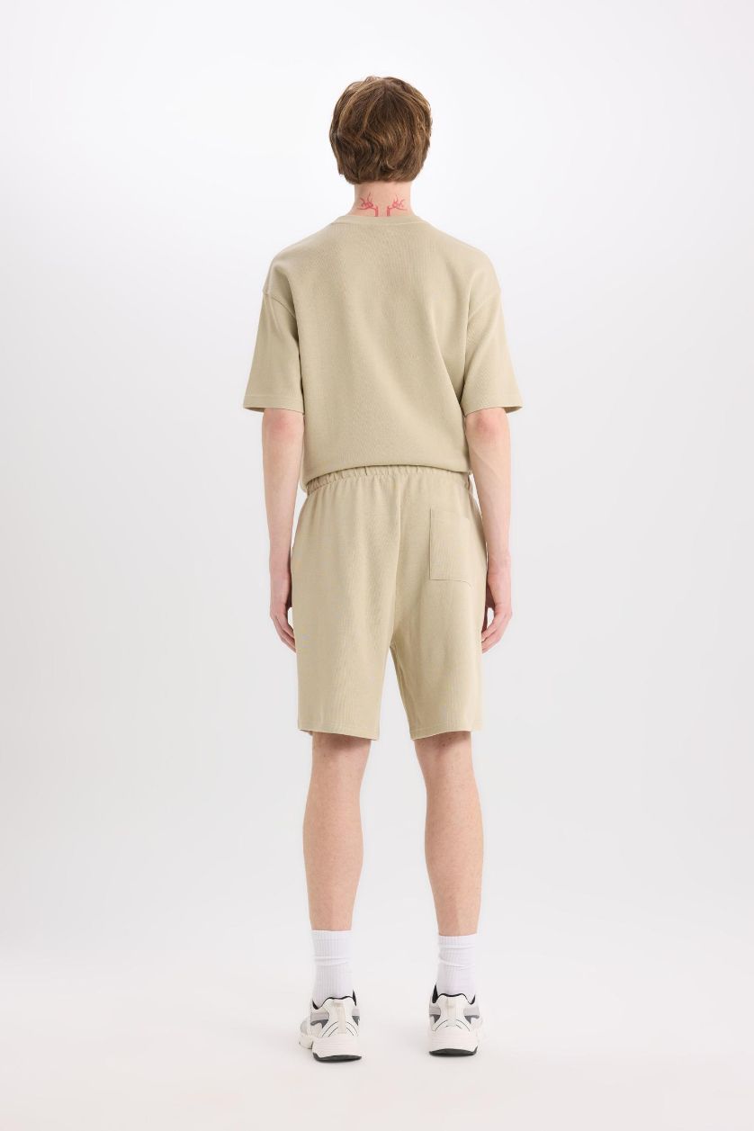 رجال كاكي فاتح شورت من قطن عادي قصة عادية