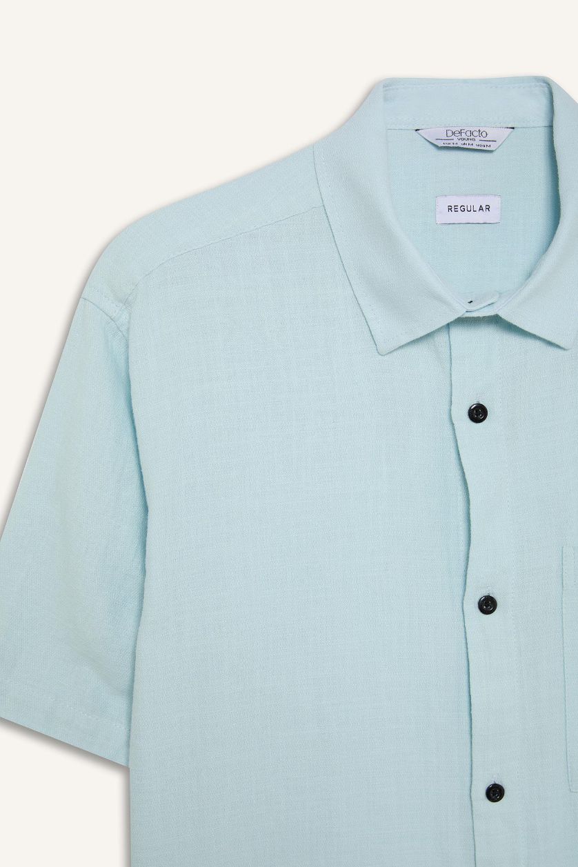 رجال أزرق فاتح قميص نص ردن قطن قصة عادية