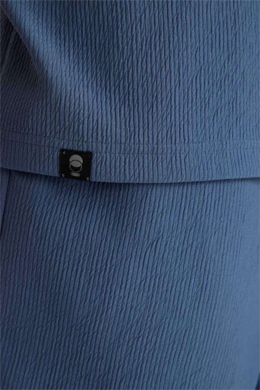 رجال نيلي فاتح تيشيرت نص كم أوفر سايز برقبة مستديرة