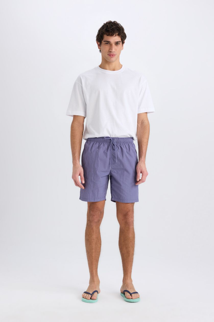 MAN Purple Regular Fit Mesh Lined Swim Shorts