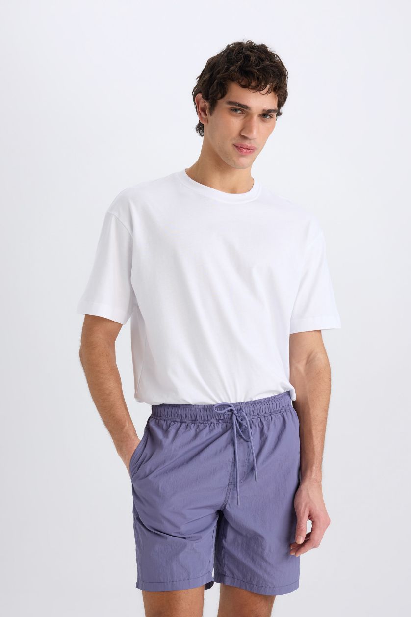 MAN Purple Regular Fit Mesh Lined Swim Shorts