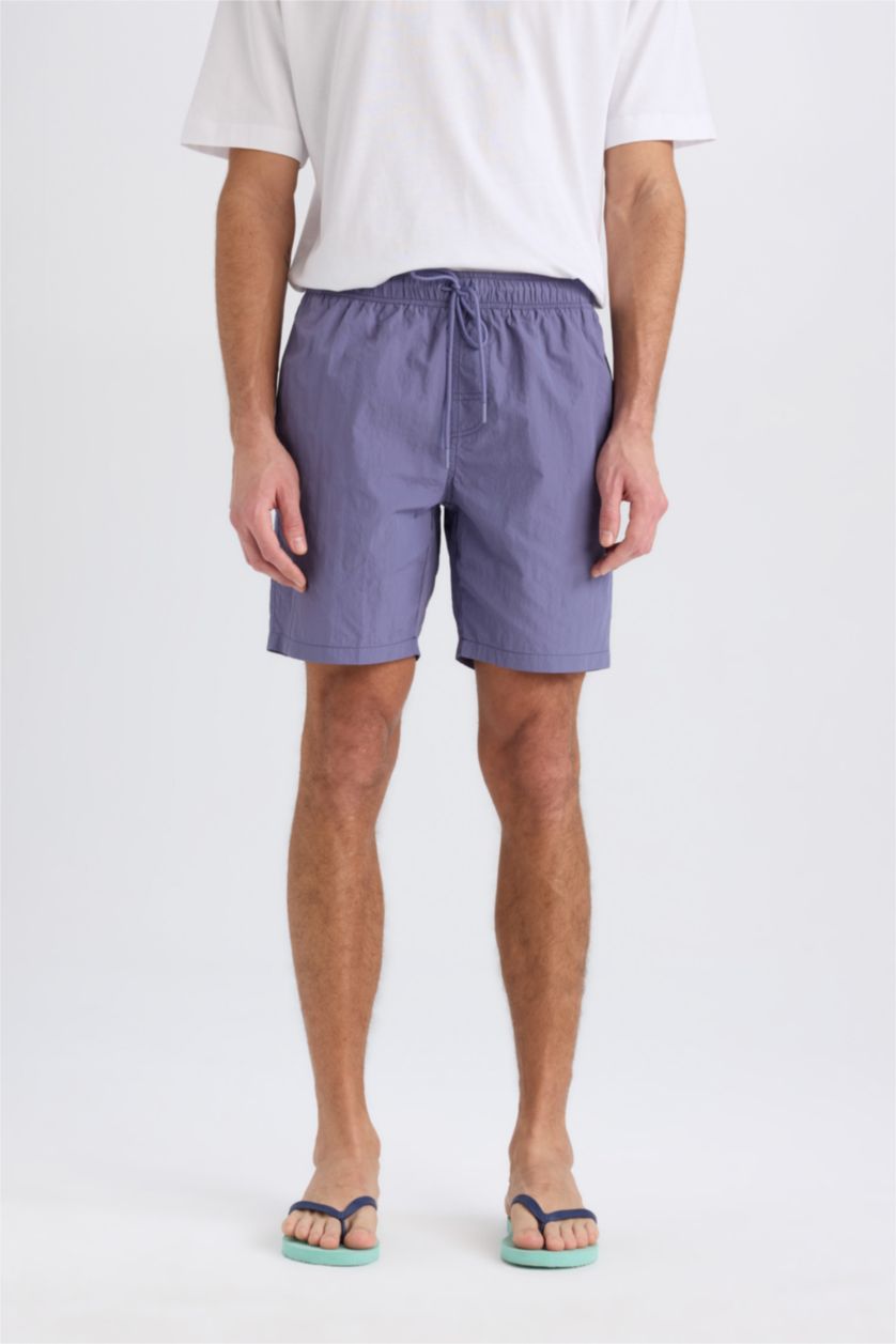 MAN Purple Regular Fit Mesh Lined Swim Shorts