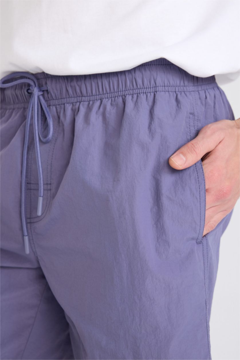 MAN Purple Regular Fit Mesh Lined Swim Shorts