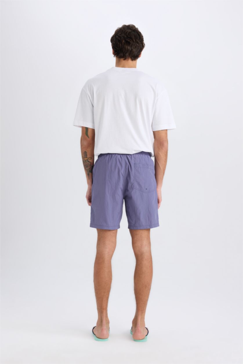 MAN Purple Regular Fit Mesh Lined Swim Shorts