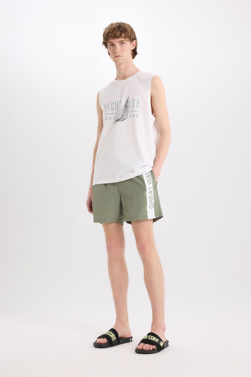 MAN Light Khaki Printed Mesh Lined Above Knee Swim Shorts