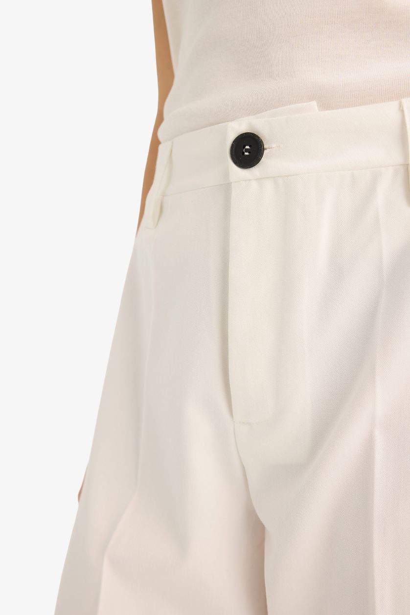 حريمي بيج فاتح بنطلون قصة مستقيمة وخصر عادي