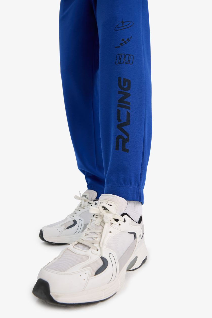 رجال أزرق فاقع بنطلون بجامة رياضي قماش سكوبا قصة عادية برجل مطاطي من DeFactoFit