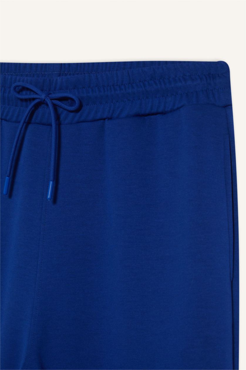 رجال أزرق فاقع بنطلون بجامة رياضي قماش سكوبا قصة عادية برجل مطاطي من DeFactoFit