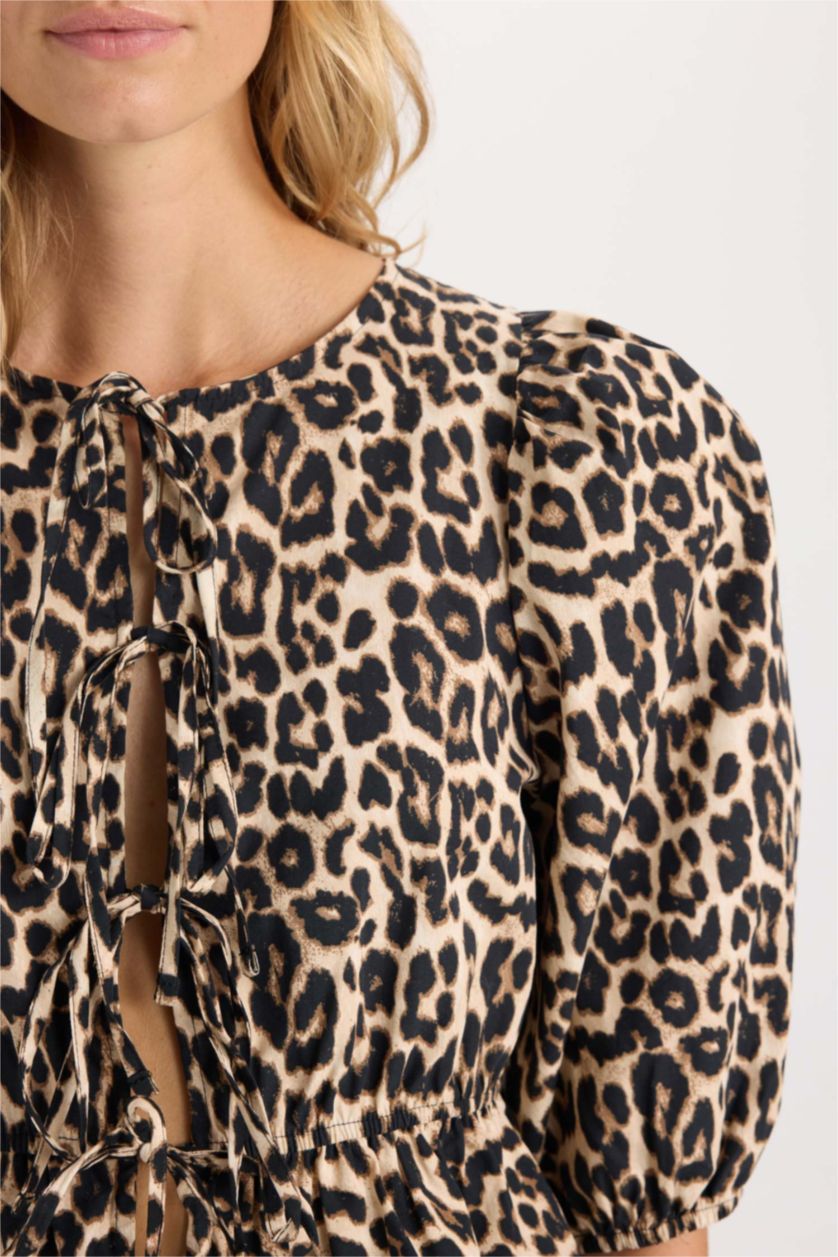 نساء بيج بلوزة كم طويل مطبوعة سليم فيت برقبة مدورة