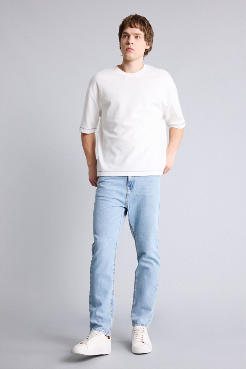 Man Light Blue 90's Slim Fit Washed Jeans
