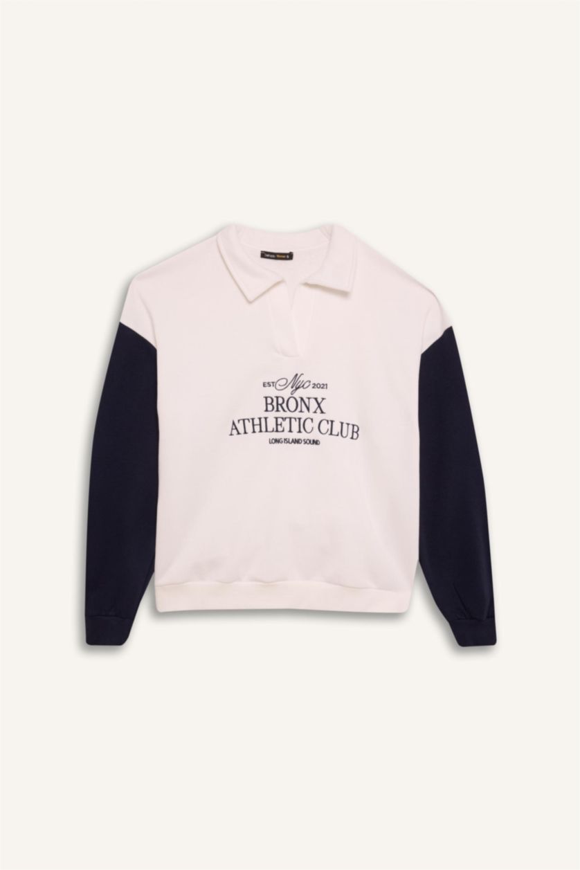 نساء بيج فاتح سويت شيرت بطبعة شعار اوفر سايز برقبة مستديرة