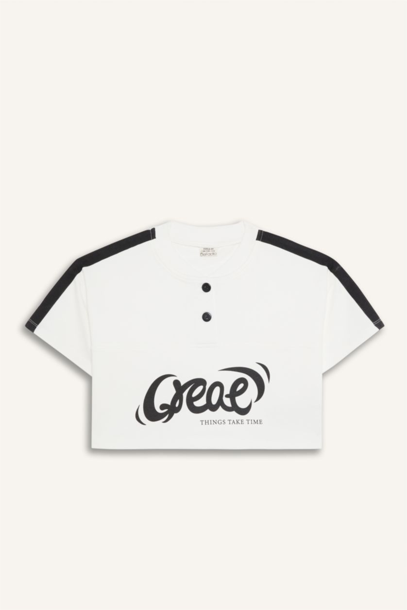 بنات بيج فاتح تيشيرت بناتي نص ردن بطبعة شعار بياخة مستديرة