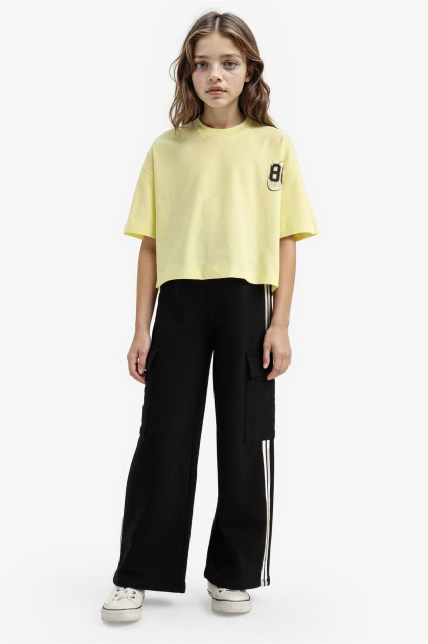 Kız Çocuk - Genç Kız Açık Sarı Oversize Geniş Kalıp Bisiklet Yaka Sırt Baskılı Kısa Kollu Tişört Kız Çocuk