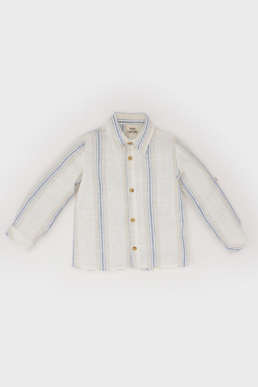 طفل صغير بيج فاتح قميص مخطط بيبي اولادي قصة عادية