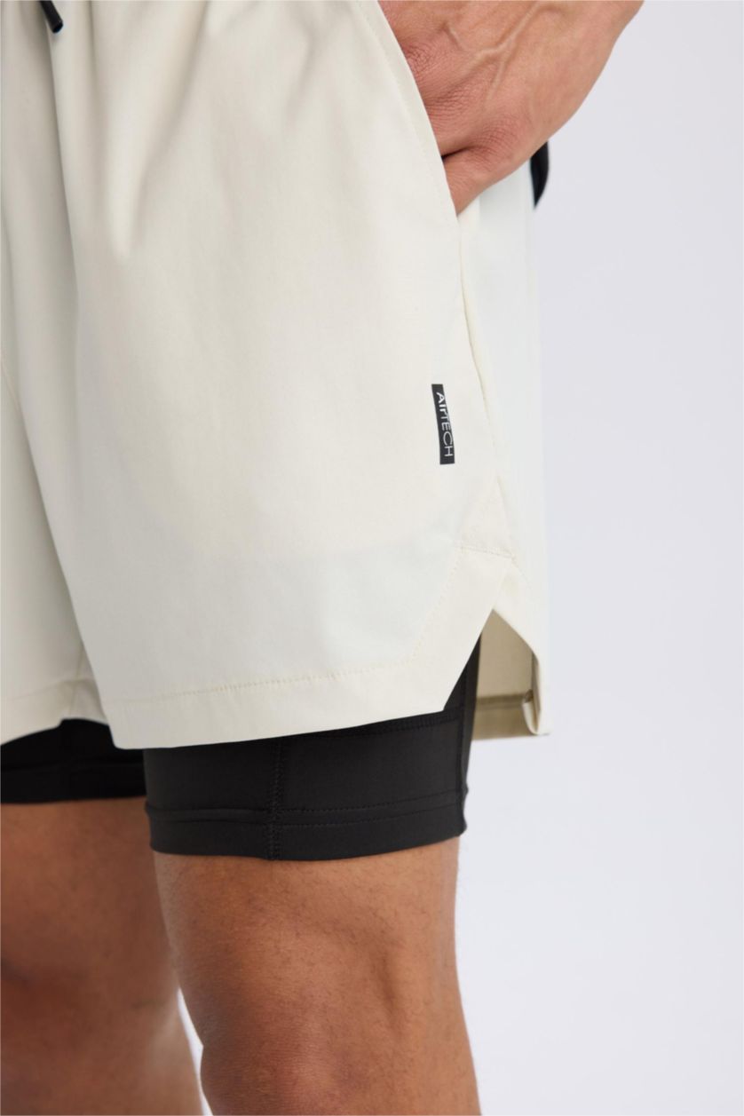 Erkek Açık Bej Slim Fit Dar Kesim Sporcu Taytlı Şort