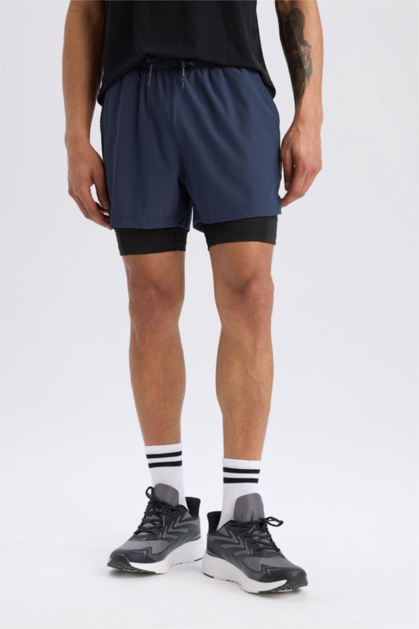 Erkek Lacivert Slim Fit Dar Kesim Sporcu Taytlı Şort