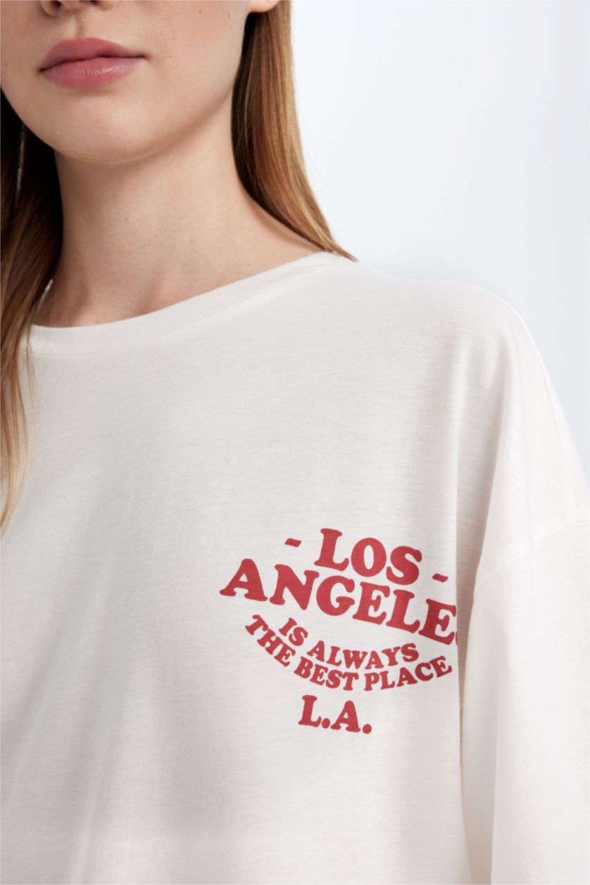 نساء اوف وايت تيشيرت نص كم واسع برقبة مستديرة