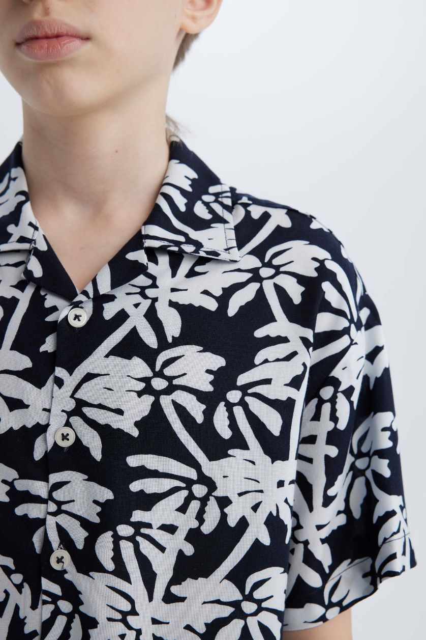 أولادي كحلي قميص اولادي نص كم اوفر سايز بياقة بولو