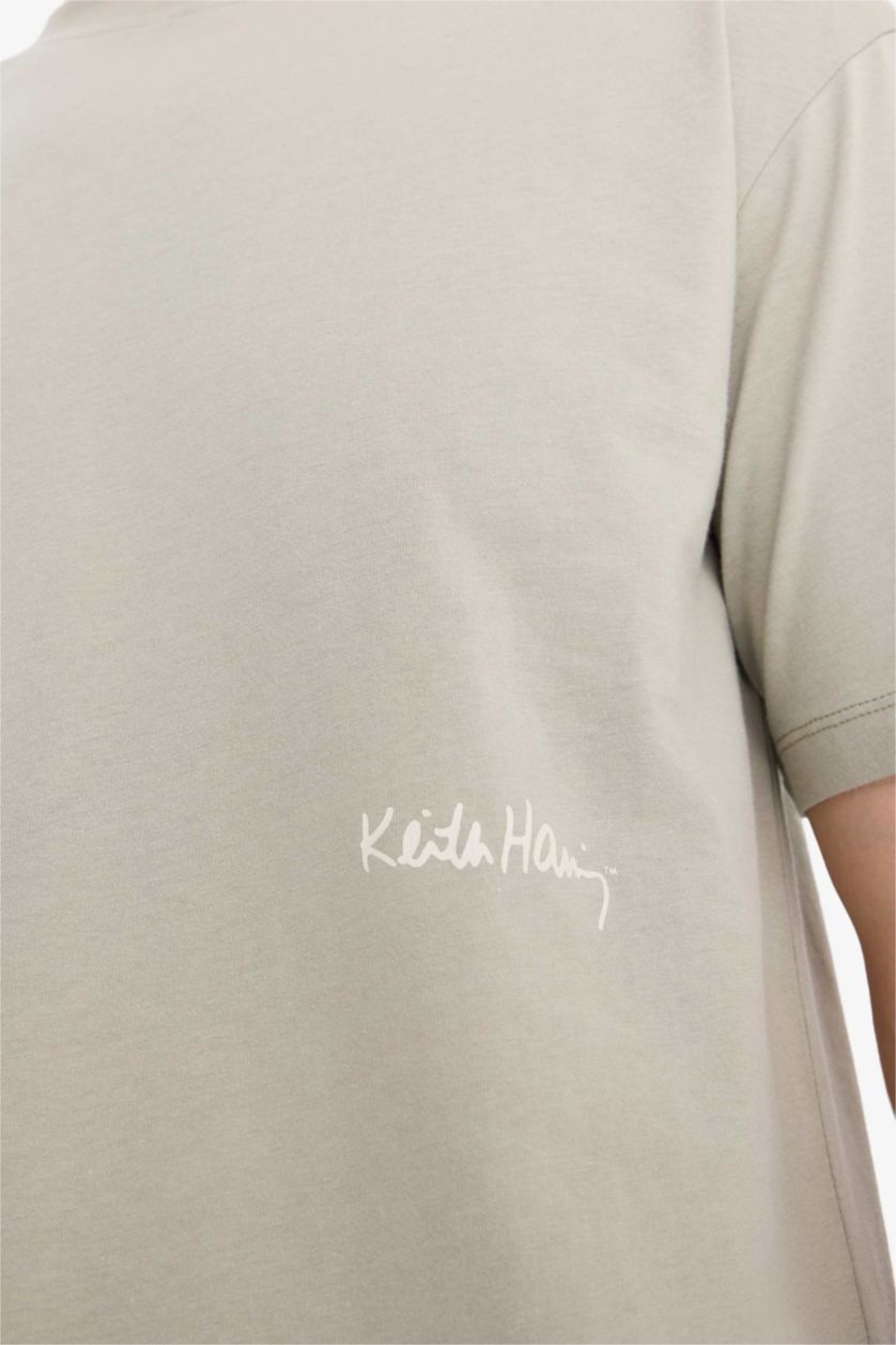 Erkek Açık Haki %100 Pamuk  Haring Boxy Fit Bisiklet Yaka Sırt Baskılı Kısa Kollu Tişört