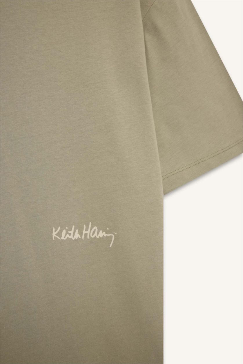 Erkek Açık Haki %100 Pamuk  Haring Boxy Fit Bisiklet Yaka Sırt Baskılı Kısa Kollu Tişört