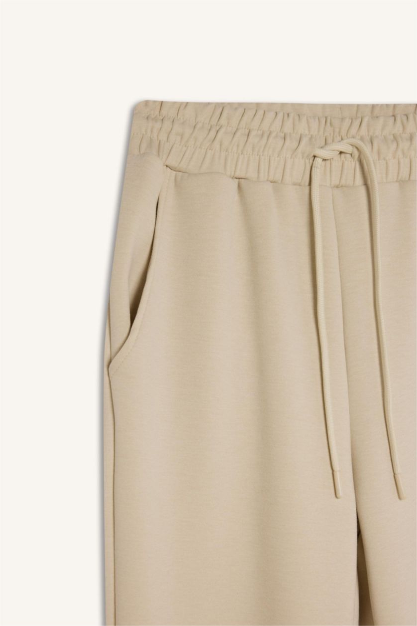 Kadın Kum Standart Fit Uzun İnce Jogger Eşofman Altı Cepli Beli Paçası Lastikli