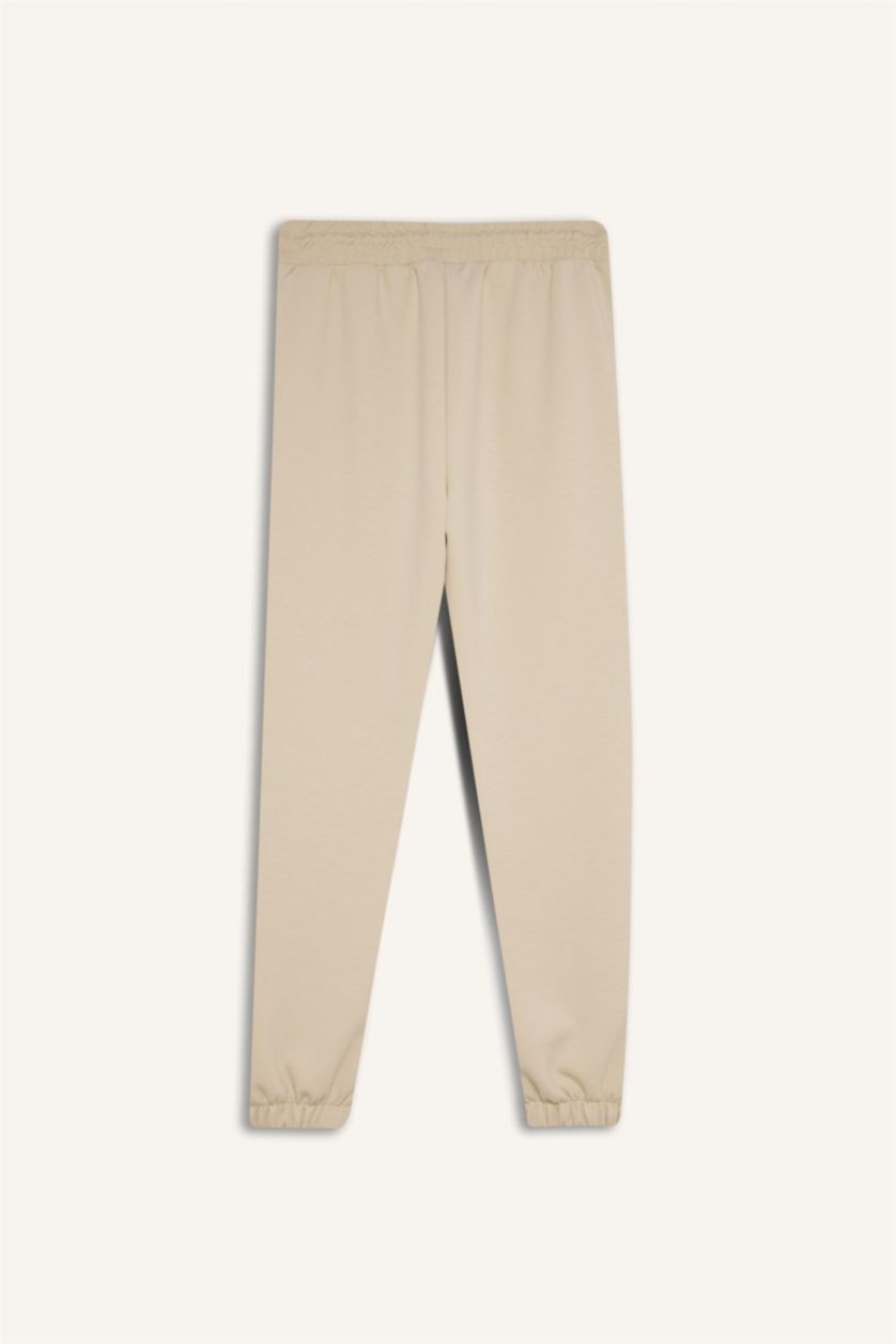 Kadın Kum Standart Fit Uzun İnce Jogger Eşofman Altı Cepli Beli Paçası Lastikli