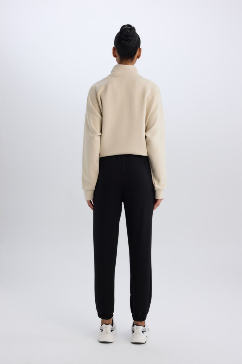 Kadın Siyah Standart Fit Uzun İnce Jogger Eşofman Altı Cepli Beli Paçası Lastikli