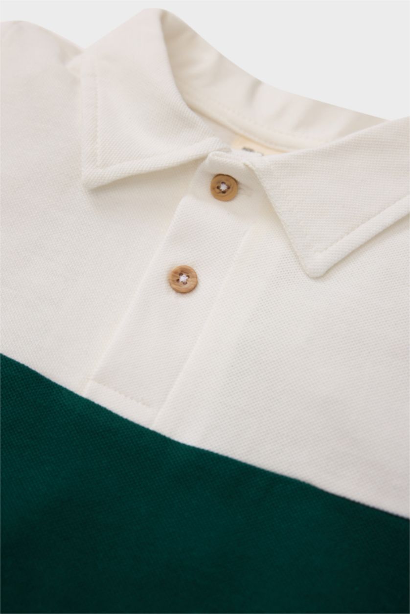 طفل صغير بيج فاتح تيشيرت بولو ولادي بيكيه ملون قصة عادية