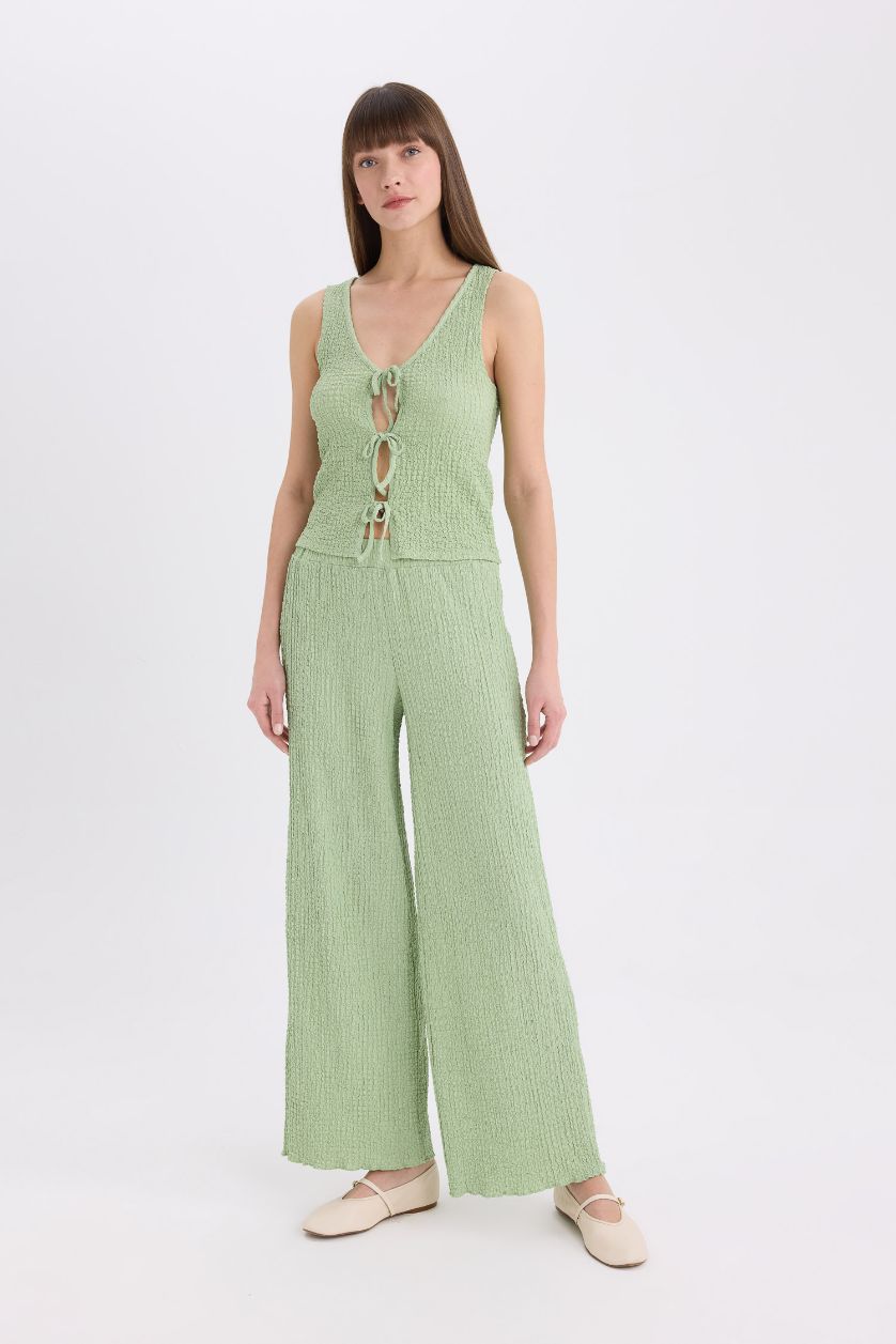 FEMME Bleu Pantalon large en tissu gaufré