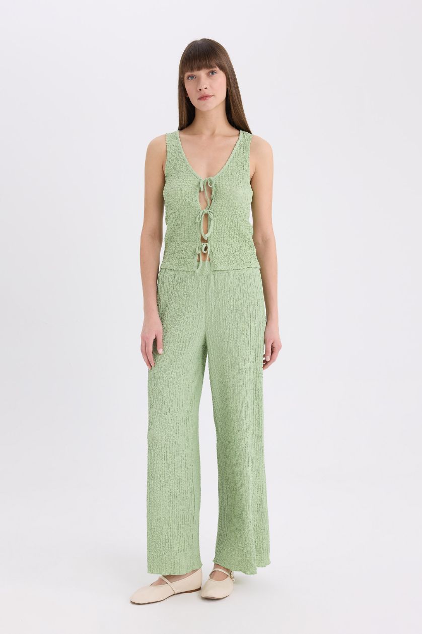 FEMME Bleu Pantalon large en tissu gaufré