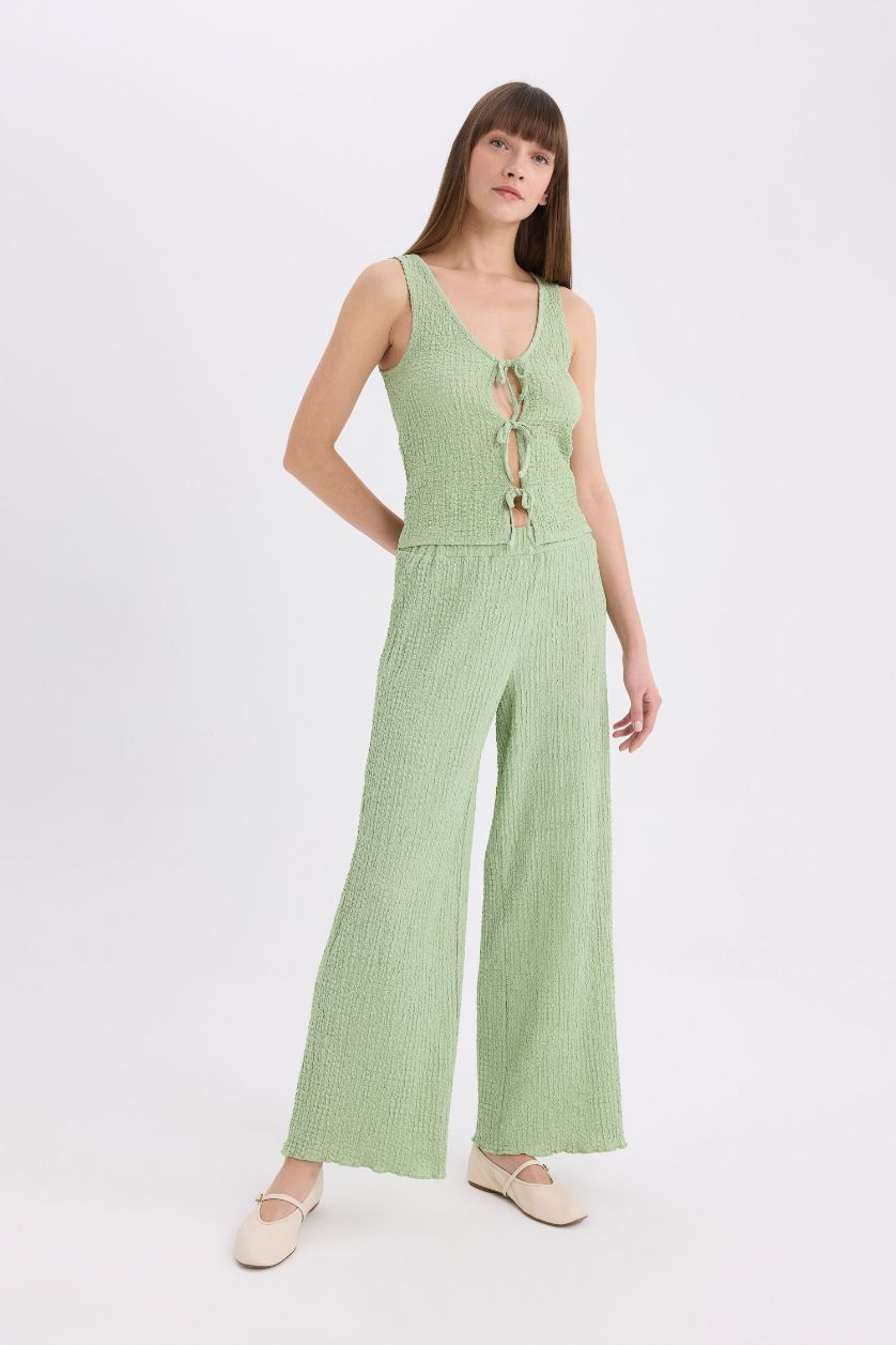 FEMME Bleu Pantalon large en tissu gaufré