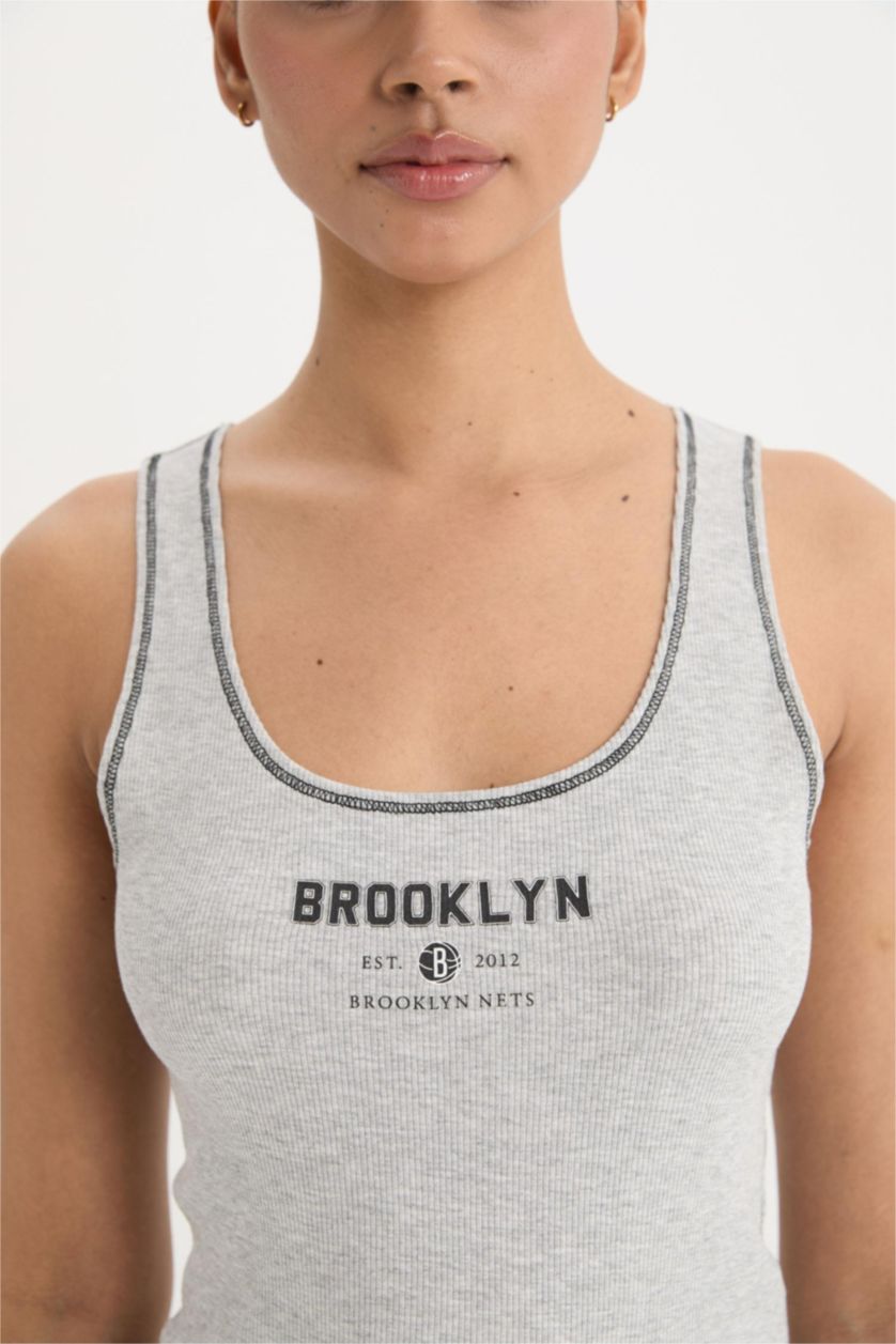 نساء ميلانج رمادي فاتح ديباردور مضلع قصة عادية بياقة مستديرة بدون كم