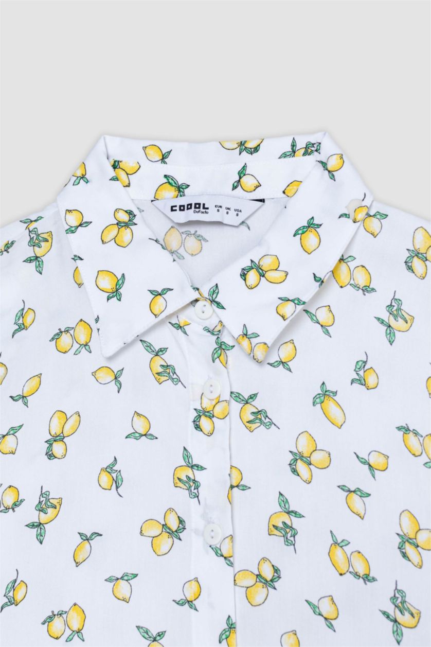 حريمي أصفر قميص نص كم اصفر فيسكوز قصة عادية