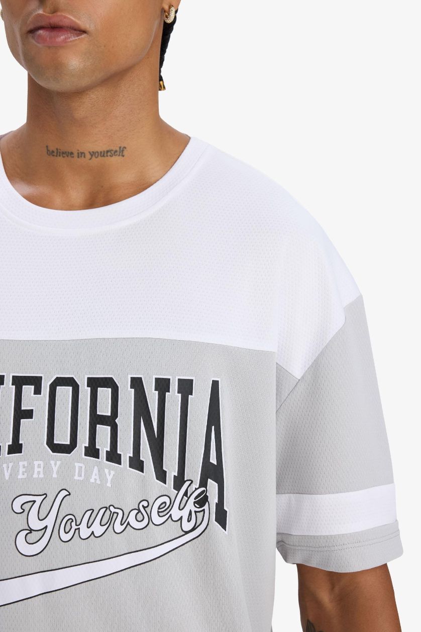 Erkek Açık Gri Hızlı Kuruyan Oversize Geniş Kalıp Bisiklet Yaka Baskılı Sporcu Kısa Kollu Tişört