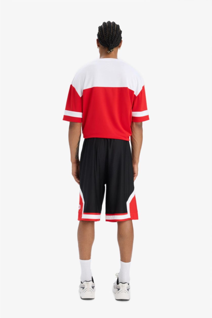 Ерлер қара басып шығарылған Шолақ шалбар