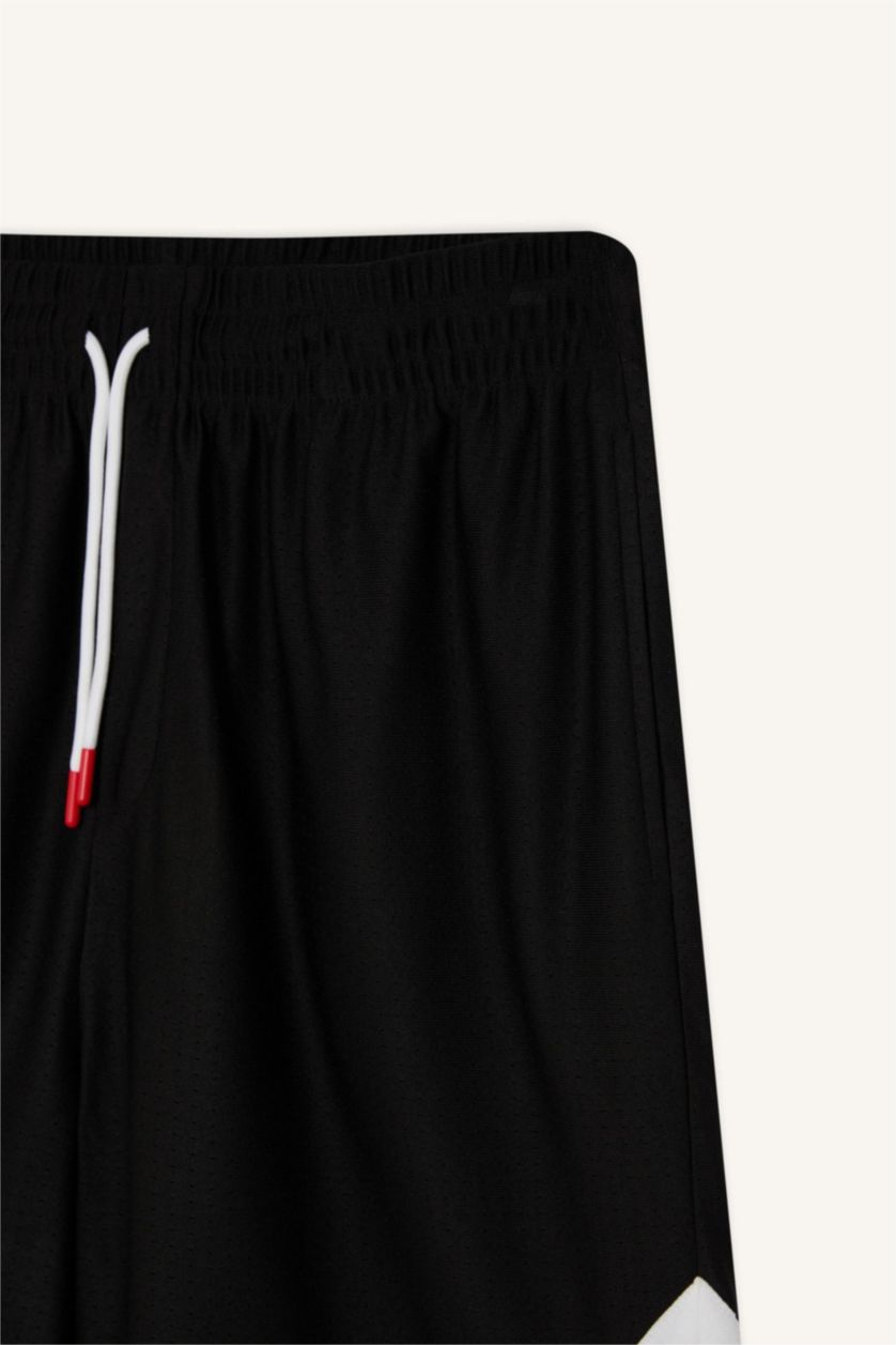 Ерлер қара басып шығарылған Шолақ шалбар