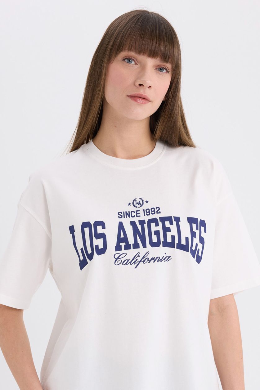 حريمي بيج فاتح تيشيرت كاجوال اوفر سايز نص كم برقبة مستديرة