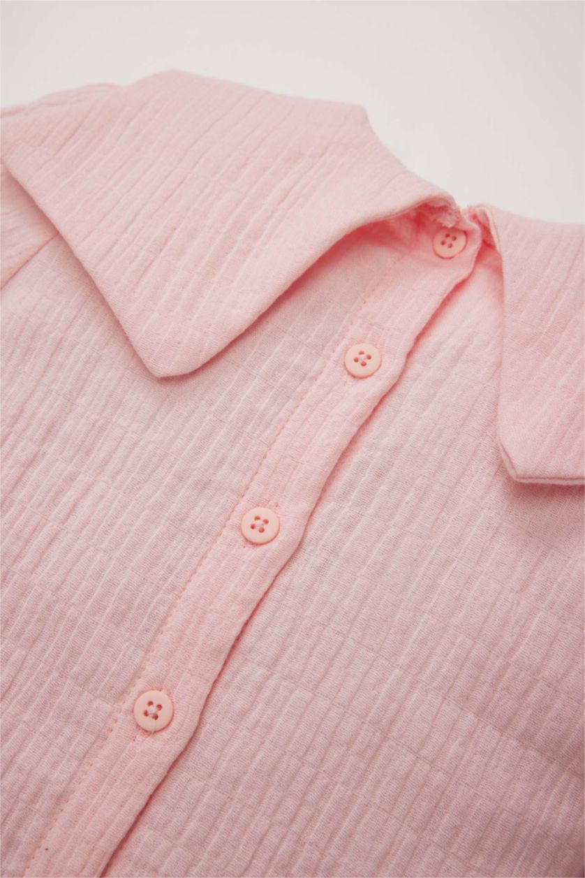 طفلة صغيرة زهري فاتح قميص بنات كم طويل من موسلين بقصة عادية