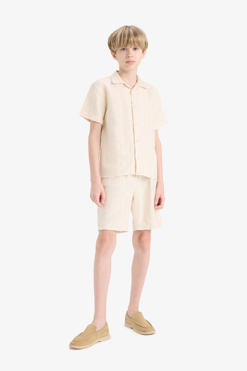 أولاد اللون الرملي قميص أولاد نص كم اوفر سايز برقبة بولو