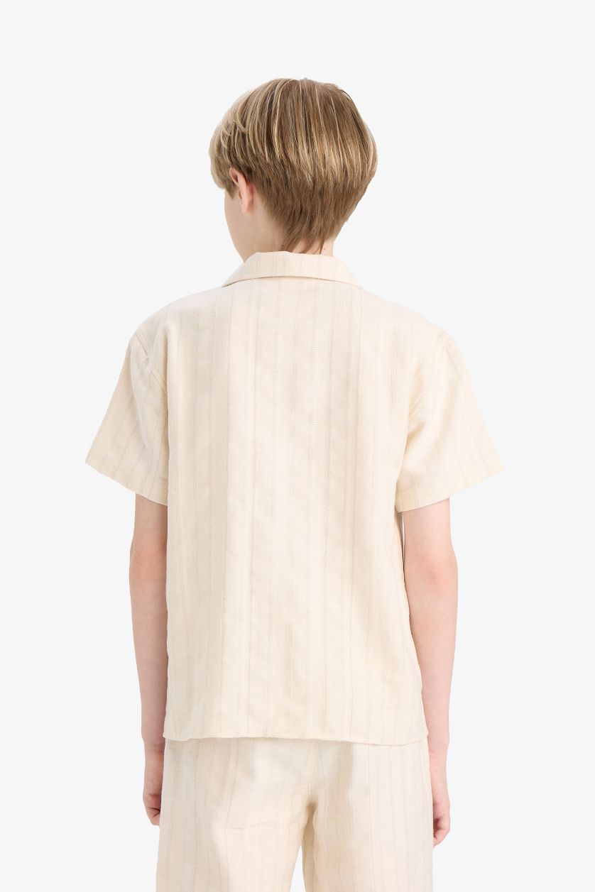 أولاد اللون الرملي قميص أولاد نص كم اوفر سايز برقبة بولو