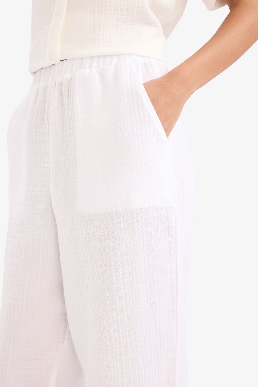 حريمي أبيض بنطلون موسلين تابيرد فيت برجل ضيقة وخصر عالي