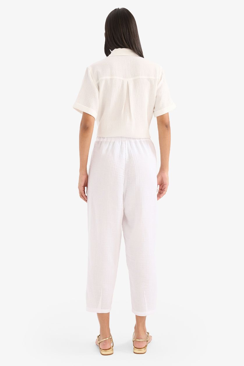 حريمي أبيض بنطلون موسلين تابيرد فيت برجل ضيقة وخصر عالي