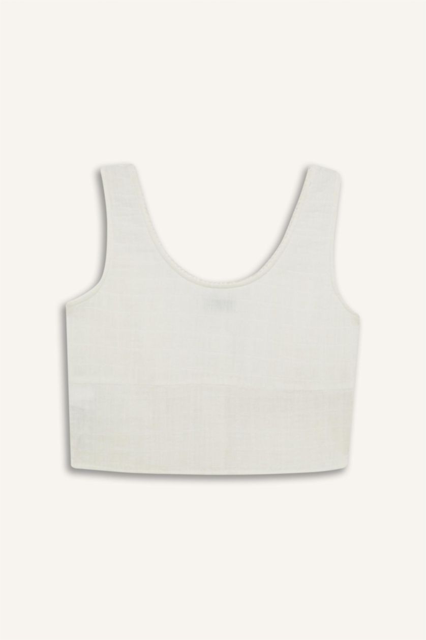 نساء اوف وايت بلوزة بدون أكمام سليم فيت من موسلين برقبة مستديرة