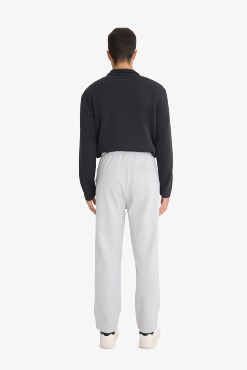 رجال رمادي فاتح بنطرون بجامة رياضي قصة عادية برجل عادي