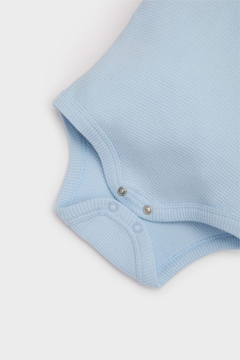 طفلة صغيرة أزرق فاتح سالوبيت نص كم اولادي وافل بحري بياقة بولو