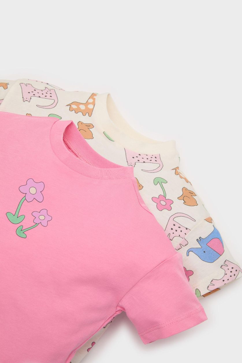 طفلة صغيرة بيج فاتح اوفر نص ردن ممشط مطبوعة قصة عادية من قطعتين