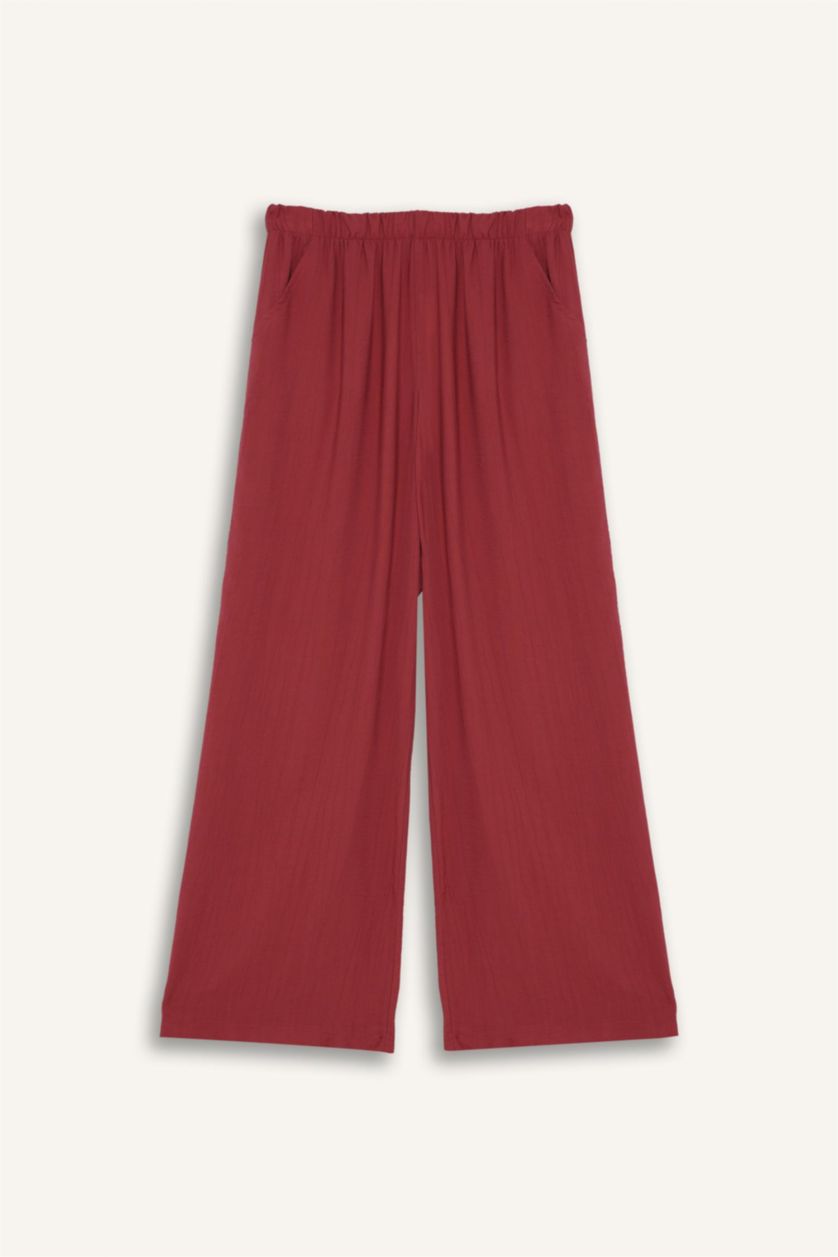 نساء خمري فاتح بنطرون قماش كرنكيل برجل واسع وايد ليج