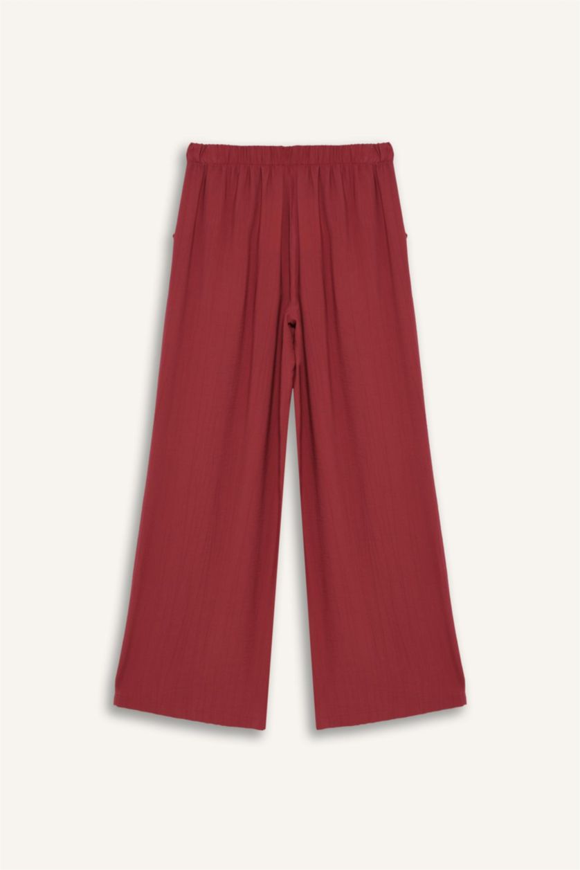 نساء خمري فاتح بنطرون قماش كرنكيل برجل واسع وايد ليج