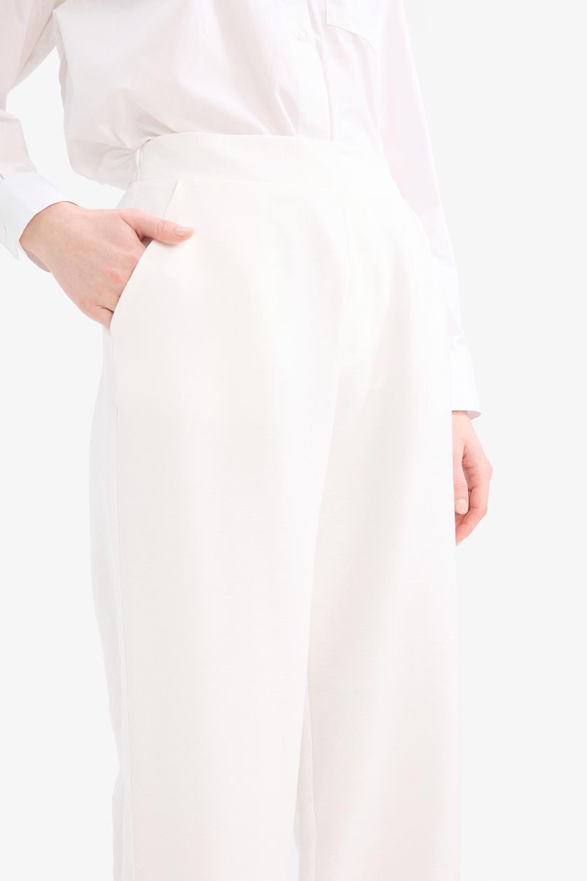 نساء بيج فاتح بنطرون وايد ليج